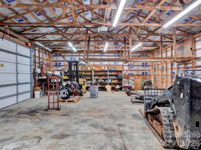 5803 Morgan Mill Road, Monroe, NC 28110.  MLS# CAR4352818, YatesRealty ID 4698. Tractor mechanic barn