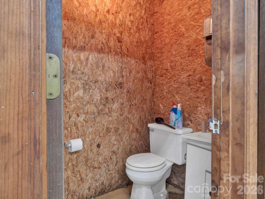 5803 Morgan Mill Road, Monroe, NC 28110.  MLS# CAR4352818, YatesRealty ID 4698. Tractor mechanic shed has bathroom!