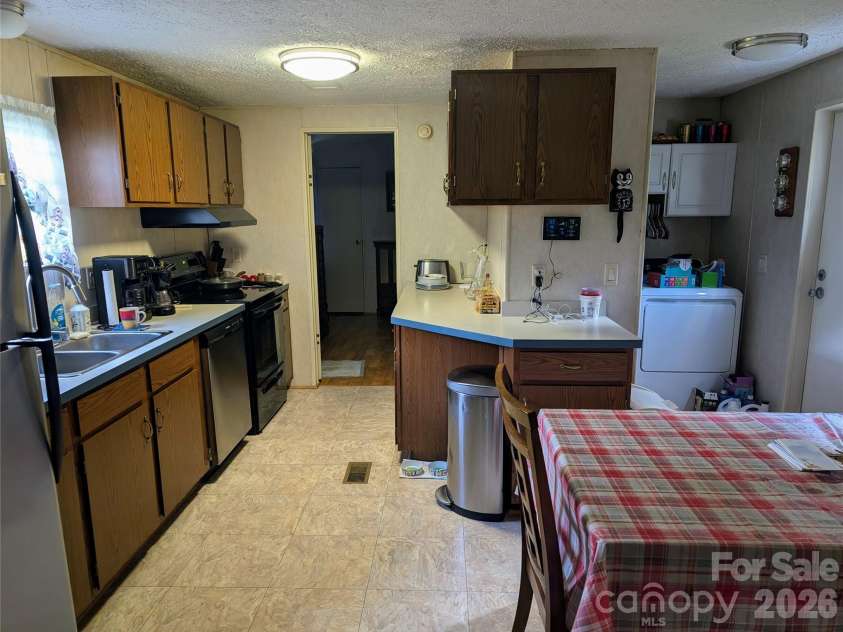 574 and 576 Paint Fork Road, Barnardsville, NC 28709.  MLS# CAR4418106, YatesRealty ID 46983. Kitchen 576 Paint Fork