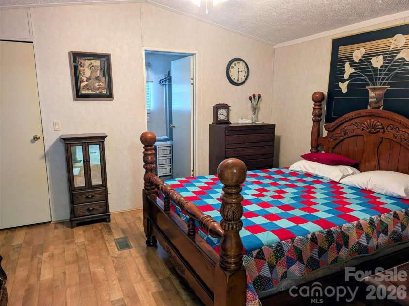 574 and 576 Paint Fork Road, Barnardsville, NC 28709.  MLS# CAR4418106, YatesRealty ID 46983. Primary bedroom 576 Paint Fork