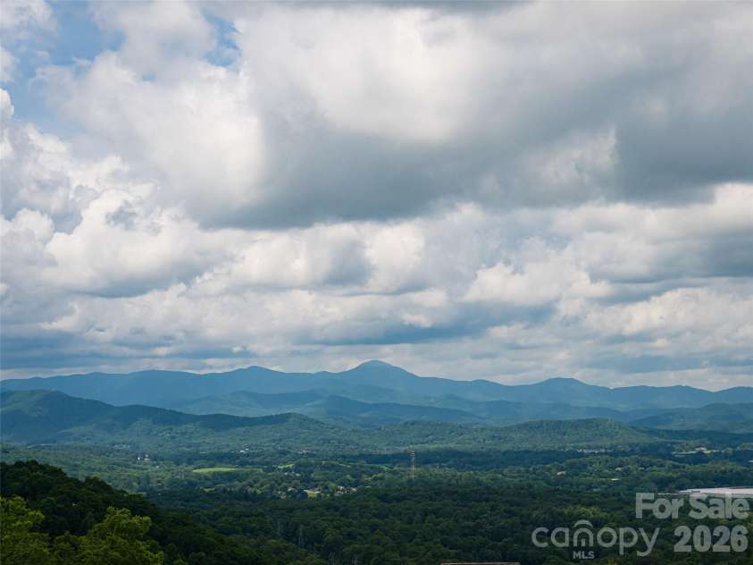 24 Watchman Drive, Hendersonville, NC 28791.  MLS# CAR4215455, YatesRealty ID 4699. Beautiful multi-layered mountain views
