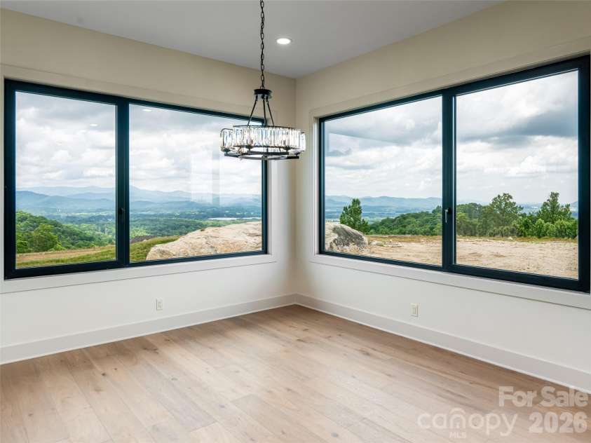 24 Watchman Drive, Hendersonville, NC 28791.  MLS# CAR4215455, YatesRealty ID 4699. Dining Room showcasing fantastic multi-layered Mountain Views 