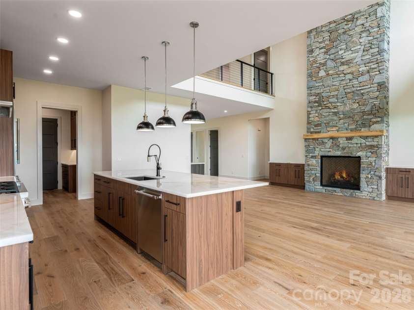 24 Watchman Drive, Hendersonville, NC 28791.  MLS# CAR4215455, YatesRealty ID 4699. Kitchen / Family Room as shown from Dining Room