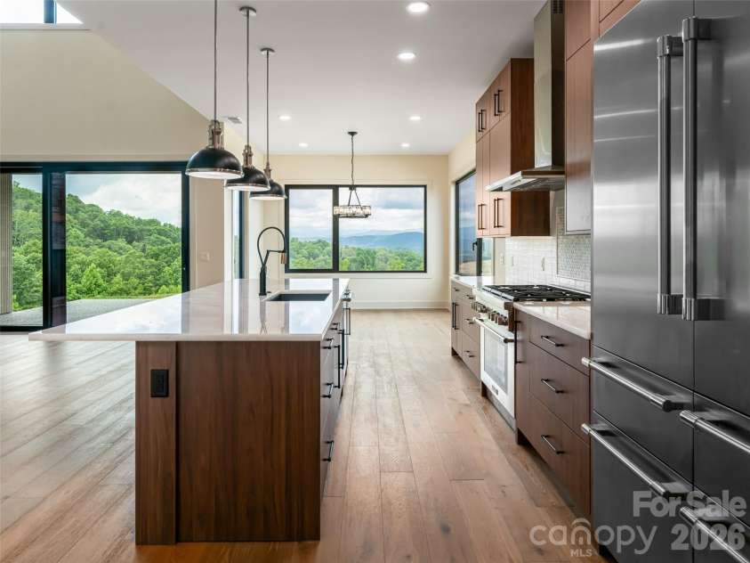 24 Watchman Drive, Hendersonville, NC 28791.  MLS# CAR4215455, YatesRealty ID 4699. Kitchen - Quartzite Countertops and Thermador Appliances