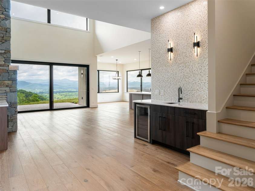 24 Watchman Drive, Hendersonville, NC 28791.  MLS# CAR4215455, YatesRealty ID 4699. Looking into Family Room from Entryway