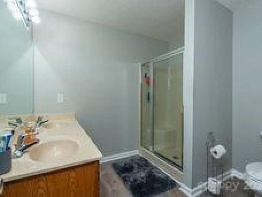 1303 Hyde Park Drive, Asheville, NC 28806.  MLS# CAR4274896, YatesRealty ID 47. Easy, step-in shower in the primary bath.