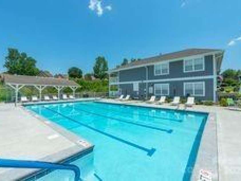1303 Hyde Park Drive, Asheville, NC 28806.  MLS# CAR4274896, YatesRealty ID 47. The pool and clubhouse host fun and fellowship