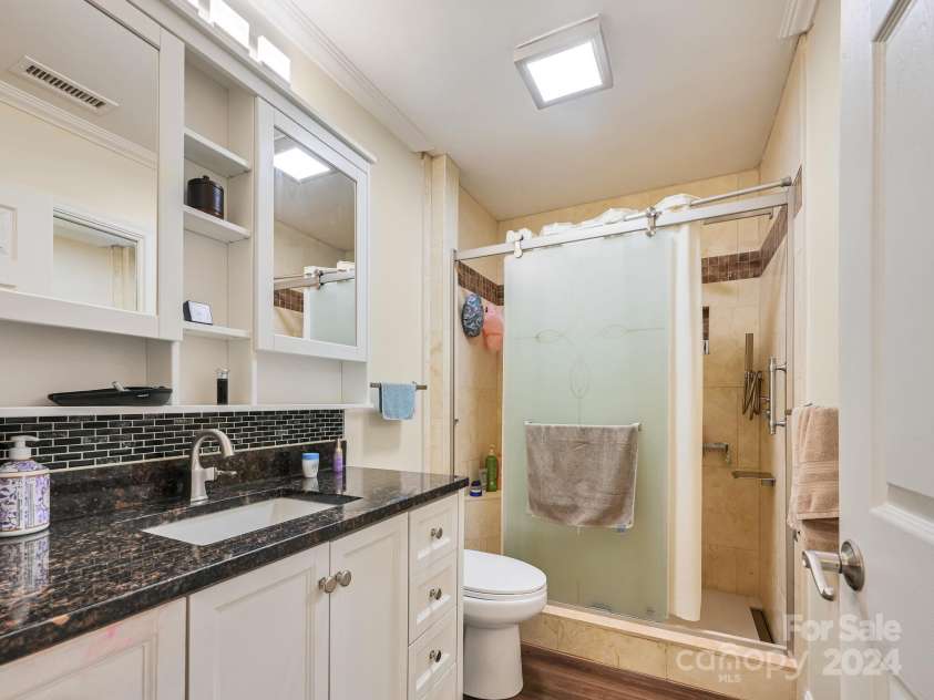 433 Lakey Gap Road, Black Mountain, NC 28711.  MLS# CAR4145724, YatesRealty ID 470. Attached bath