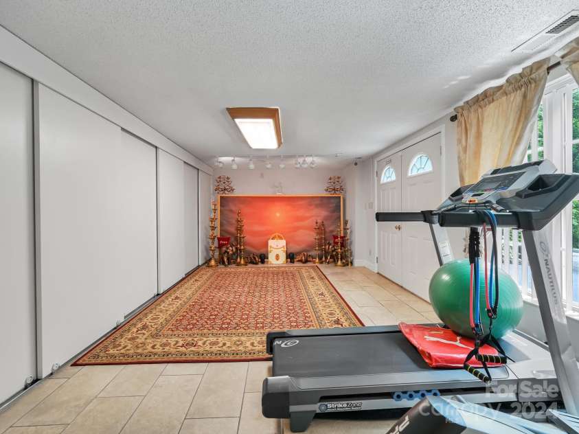 433 Lakey Gap Road, Black Mountain, NC 28711.  MLS# CAR4145724, YatesRealty ID 470. Flex space in basement with daylight entrance