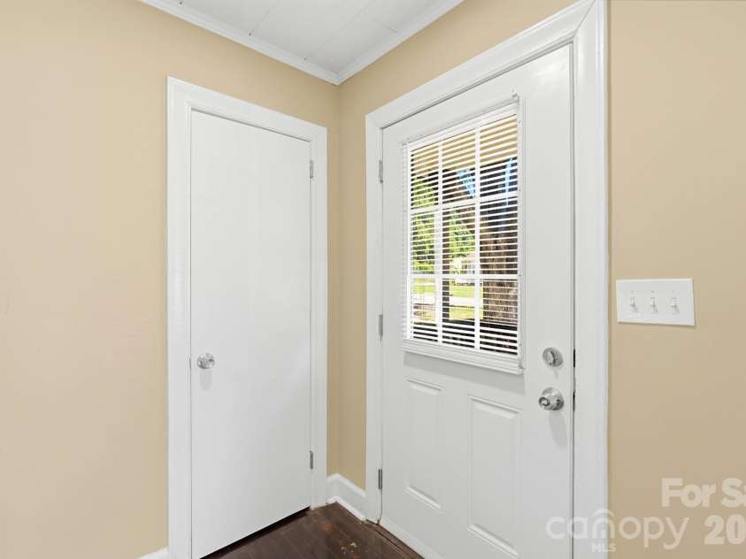 317 4th Avenue, Gastonia, NC 28054.  MLS# CAR4415299, YatesRealty ID 47005. Coat closet right off the entry way.