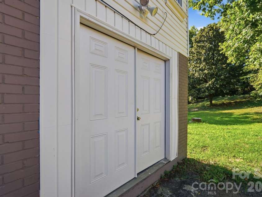 317 4th Avenue, Gastonia, NC 28054.  MLS# CAR4415299, YatesRealty ID 47005. Door to the basement
