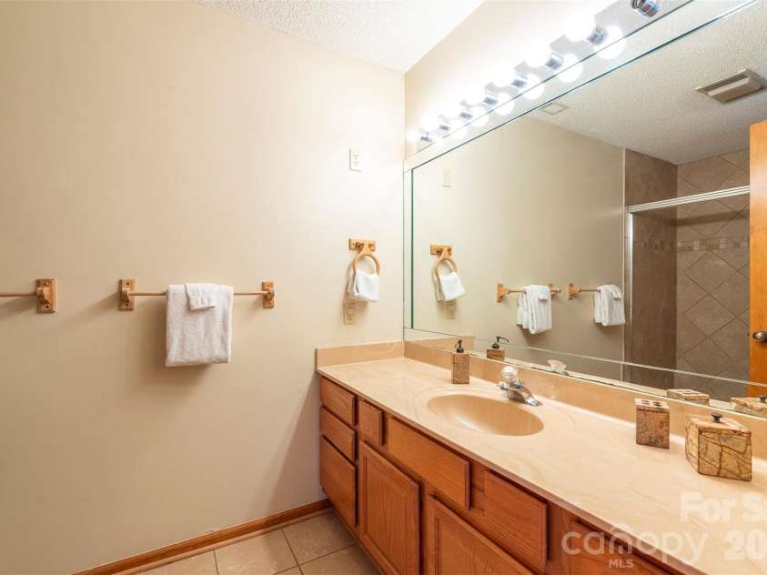 128 Quail Run Court, Lake Lure, NC 28746.  MLS# CAR4356860, YatesRealty ID 4701. 