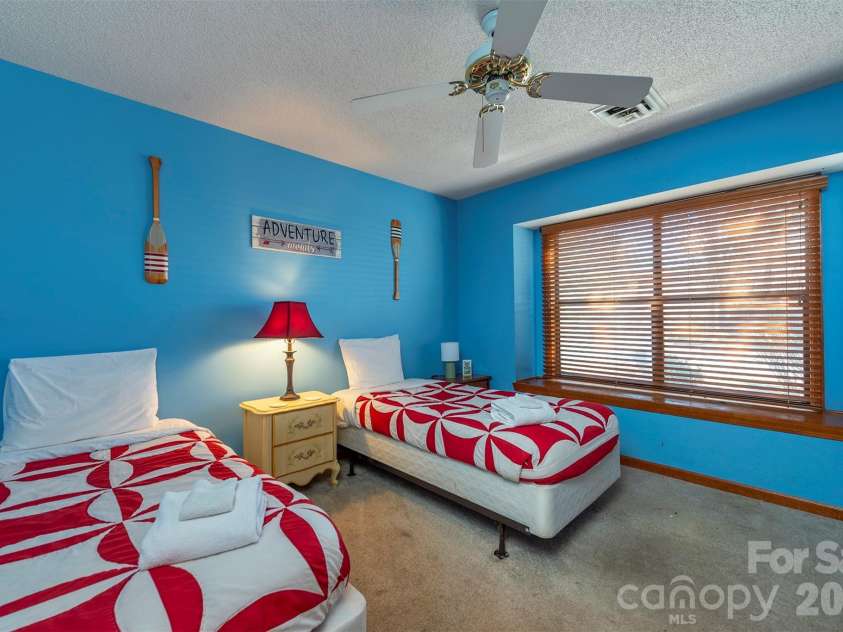 128 Quail Run Court, Lake Lure, NC 28746.  MLS# CAR4356860, YatesRealty ID 4701. 