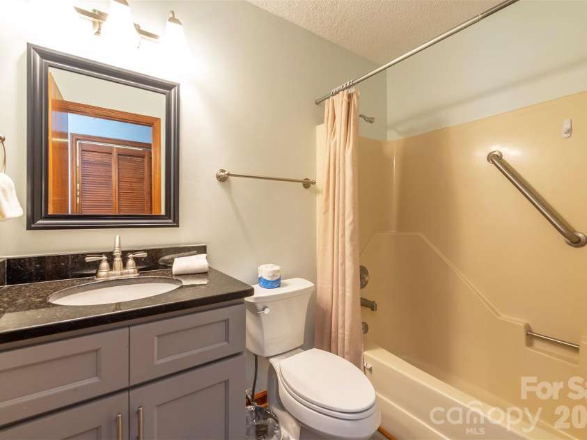 128 Quail Run Court, Lake Lure, NC 28746.  MLS# CAR4356860, YatesRealty ID 4701. 