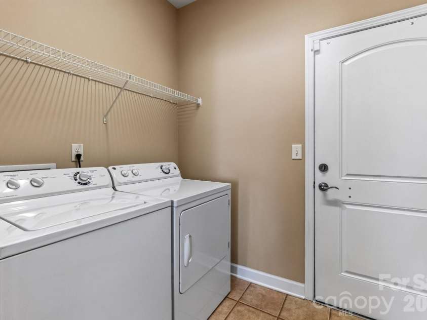 4745 Polo Gate Boulevard, Charlotte, NC 28216.  MLS# CAR4418374, YatesRealty ID 47010. Laundry Room