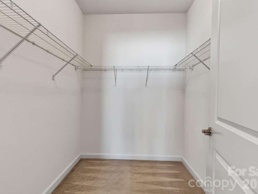4745 Polo Gate Boulevard, Charlotte, NC 28216.  MLS# CAR4418374, YatesRealty ID 47010. Walk in closet