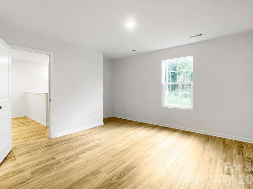 178 Panther Creek Road, Troutman, NC 28166.  MLS# CAR4418750, YatesRealty ID 47013. Primary Bedroom