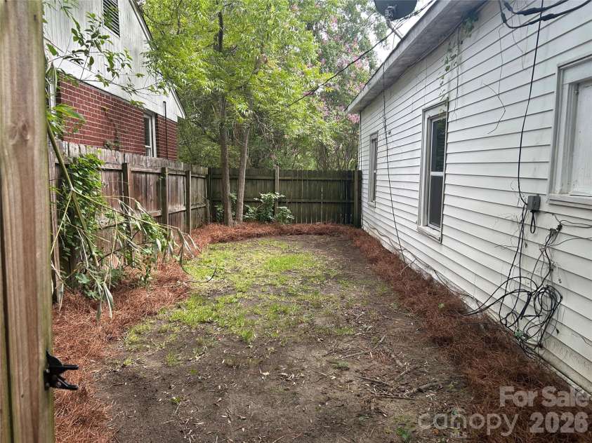 316 Arch Street, Lancaster, SC 29720.  MLS# CAR4416916, YatesRealty ID 47019. FENCED IN SIDE YARD