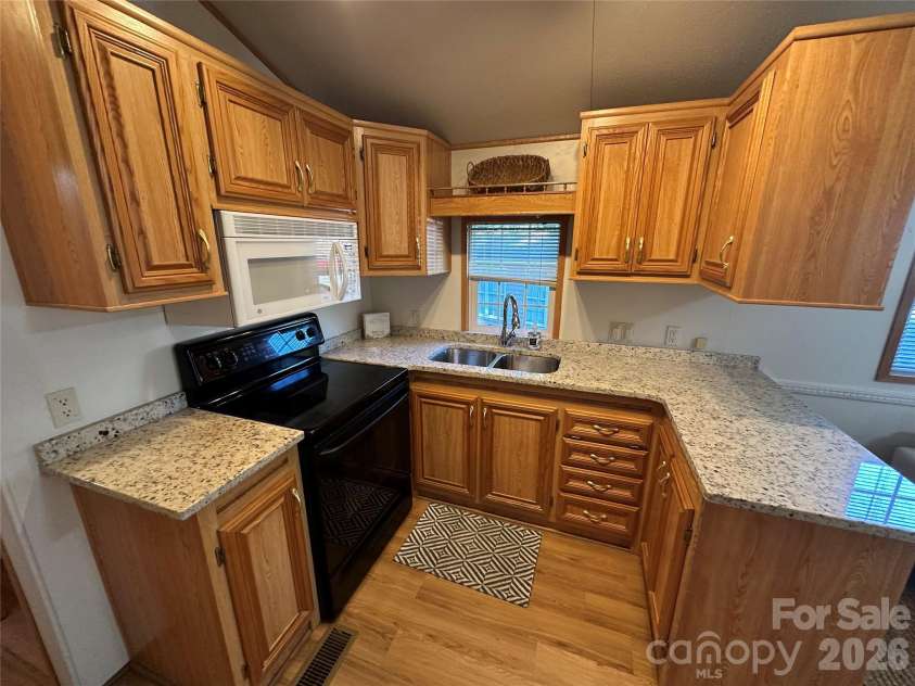 114 Walnut Circle, New London, NC 28127.  MLS# CAR4418170, YatesRealty ID 47028. 