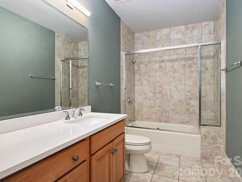 31 Bradford Vistas Drive, Fletcher, NC 28732.  MLS# CAR4303470, YatesRealty ID 4703. Lower level full bathroom