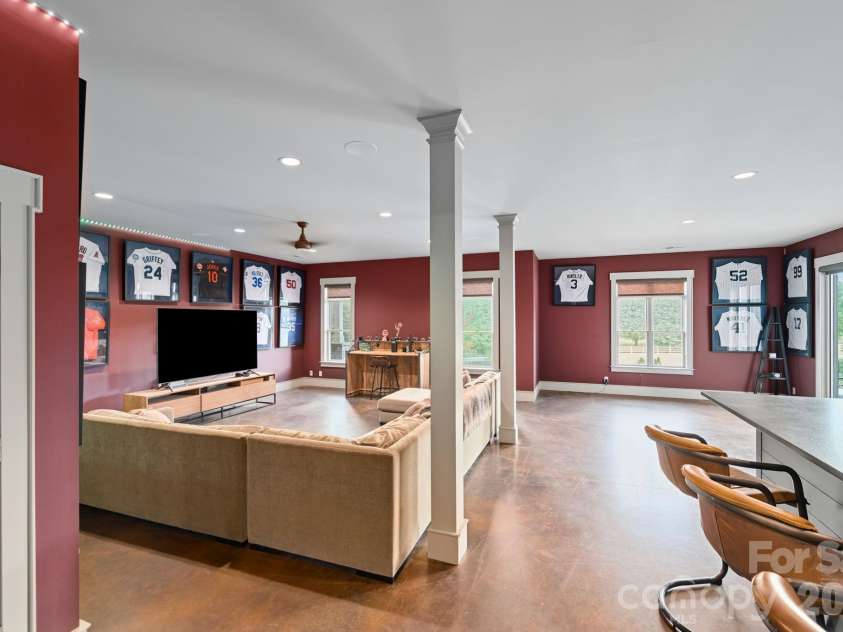 31 Bradford Vistas Drive, Fletcher, NC 28732.  MLS# CAR4303470, YatesRealty ID 4703. Lower level media room
