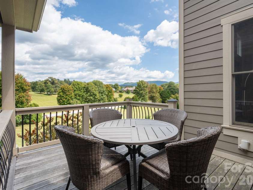 31 Bradford Vistas Drive, Fletcher, NC 28732.  MLS# CAR4303470, YatesRealty ID 4703. Main level deck access through kitchen or mudroom