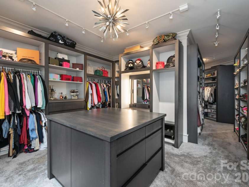 31 Bradford Vistas Drive, Fletcher, NC 28732.  MLS# CAR4303470, YatesRealty ID 4703. Show stopper custom closet and dressing room