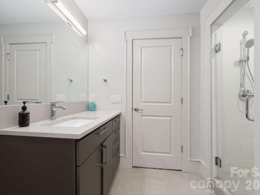31 Bradford Vistas Drive, Fletcher, NC 28732.  MLS# CAR4303470, YatesRealty ID 4703. Upper level bathroom