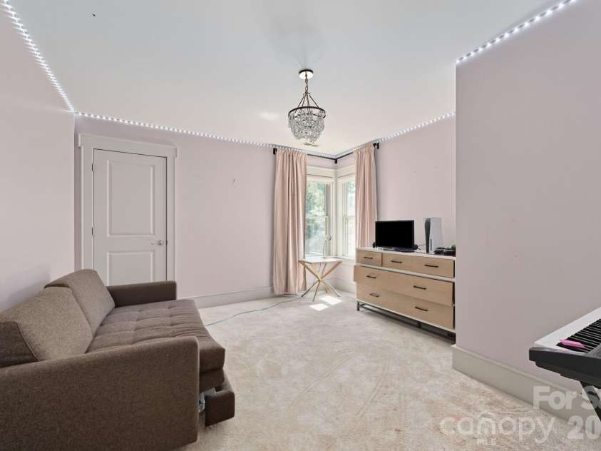 31 Bradford Vistas Drive, Fletcher, NC 28732.  MLS# CAR4303470, YatesRealty ID 4703. Upper level bedroom