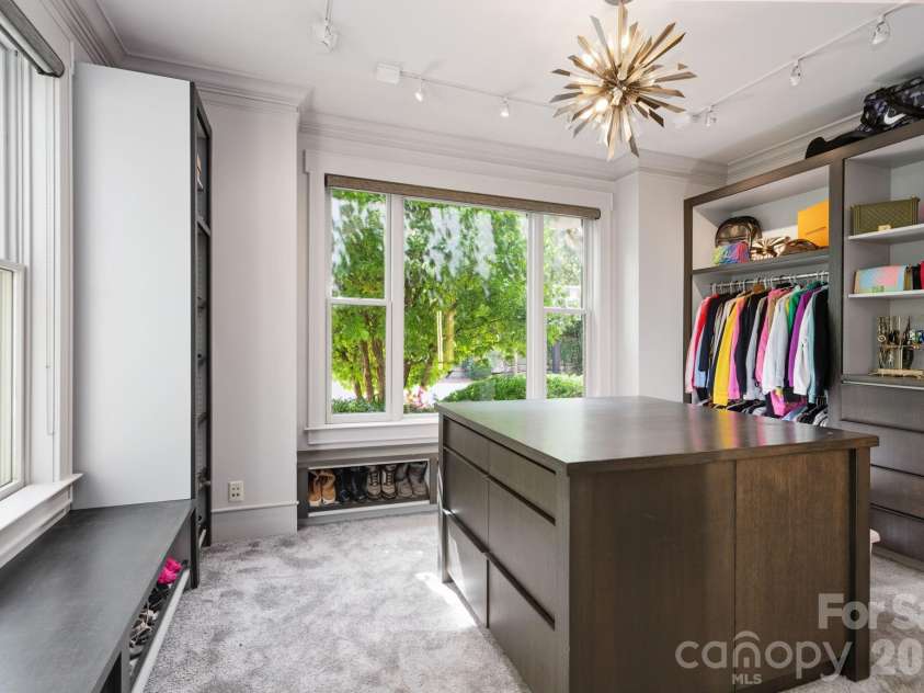 31 Bradford Vistas Drive, Fletcher, NC 28732.  MLS# CAR4303470, YatesRealty ID 4703. Vanity, dressers, and sitting area