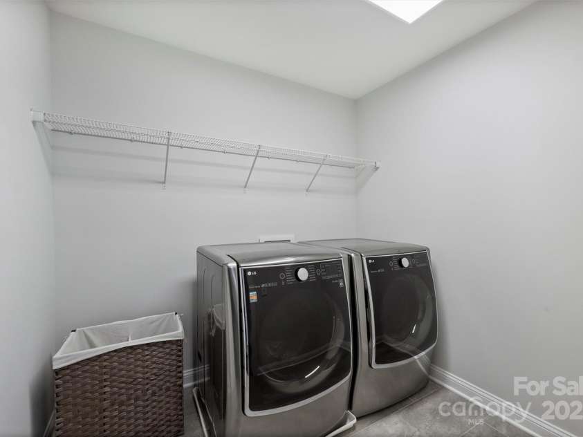 8011 Caliterra Drive, Charlotte, NC 28227.  MLS# CAR4241034, YatesRealty ID 4703. Laundry Room Upstairs
