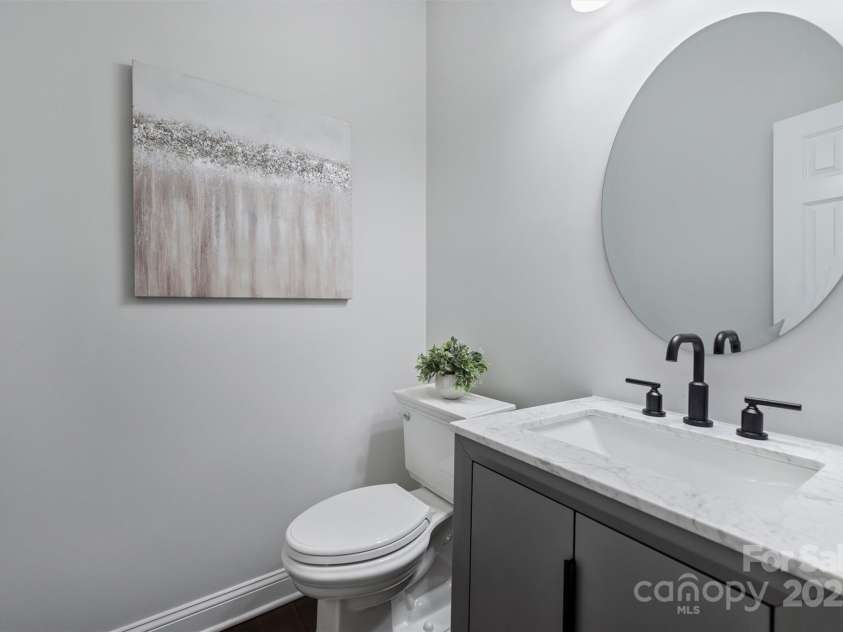 8011 Caliterra Drive, Charlotte, NC 28227.  MLS# CAR4241034, YatesRealty ID 4703. Powder Room Downstairs