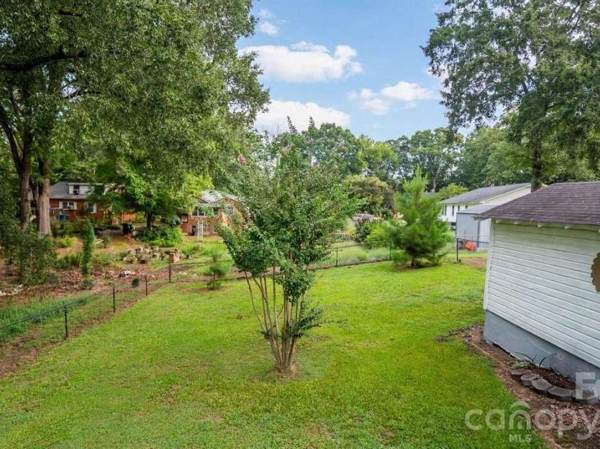 1476 Hickory Avenue, Albemarle, NC 28001.  MLS# CAR4416503, YatesRealty ID 47030. Additional Parcel adding space for entertaining