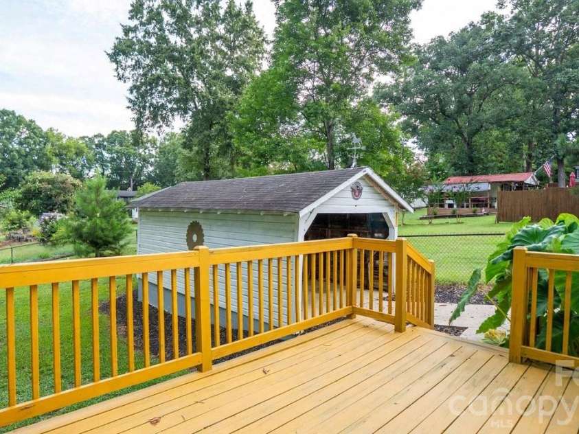 1476 Hickory Avenue, Albemarle, NC 28001.  MLS# CAR4416503, YatesRealty ID 47030. Spacious back deck