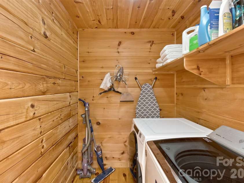 153 Tall Oaks Drive, Maggie Valley, NC 28751.  MLS# CAR4418740, YatesRealty ID 47031. Dedicated laundry room. Full sized washer/dryer!