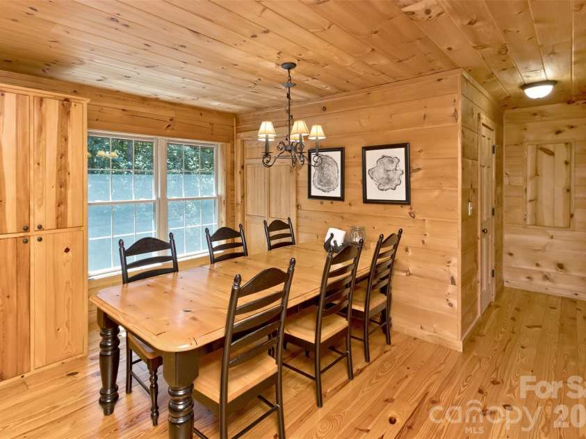 153 Tall Oaks Drive, Maggie Valley, NC 28751.  MLS# CAR4418740, YatesRealty ID 47031. Dining room is plenty big for formal gatherings.
