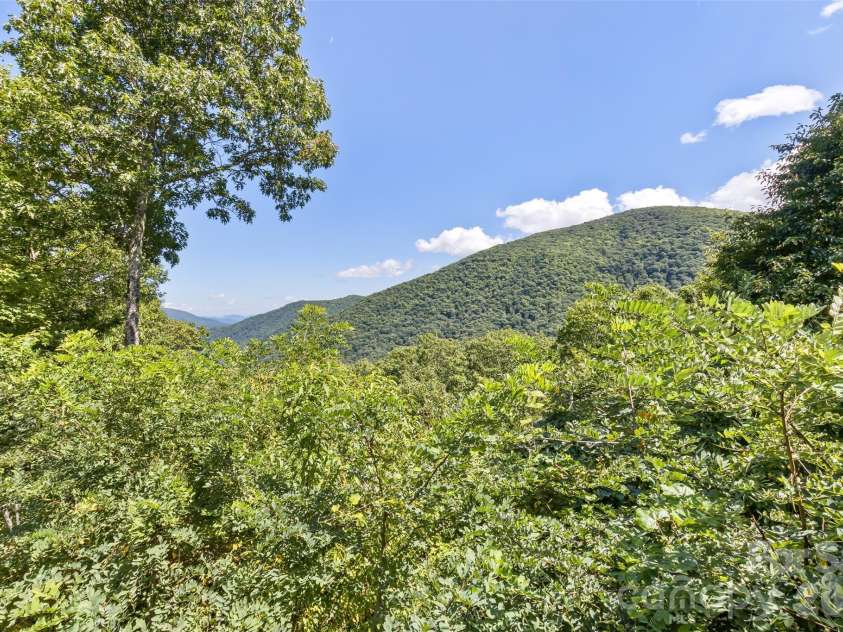 153 Tall Oaks Drive, Maggie Valley, NC 28751.  MLS# CAR4418740, YatesRealty ID 47031. Minimal clearing and complete privacy.
