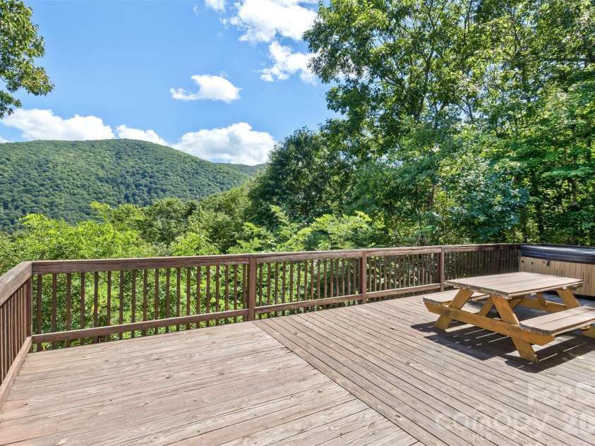 153 Tall Oaks Drive, Maggie Valley, NC 28751.  MLS# CAR4418740, YatesRealty ID 47031. Only a few steps away from this gorgeous view.