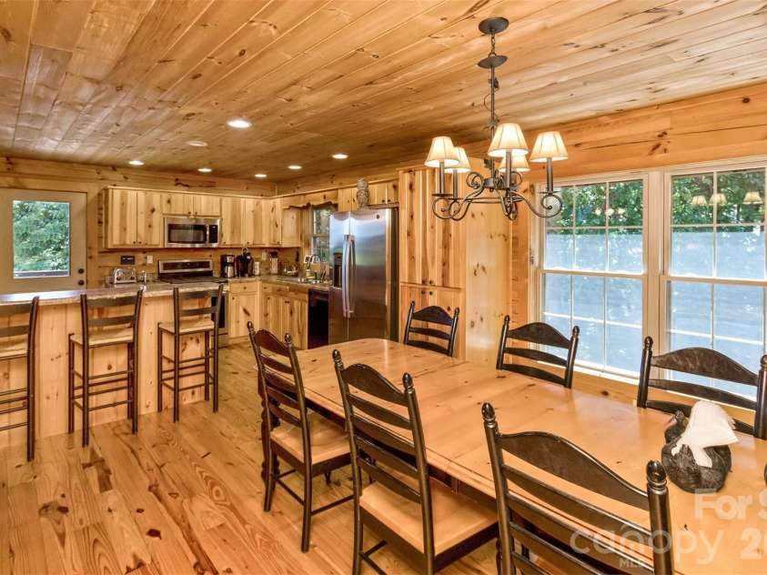 153 Tall Oaks Drive, Maggie Valley, NC 28751.  MLS# CAR4418740, YatesRealty ID 47031. Open concept kitche/dining room.