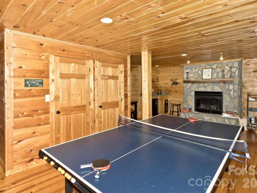 153 Tall Oaks Drive, Maggie Valley, NC 28751.  MLS# CAR4418740, YatesRealty ID 47031. Ping pong, pool, theater room?
