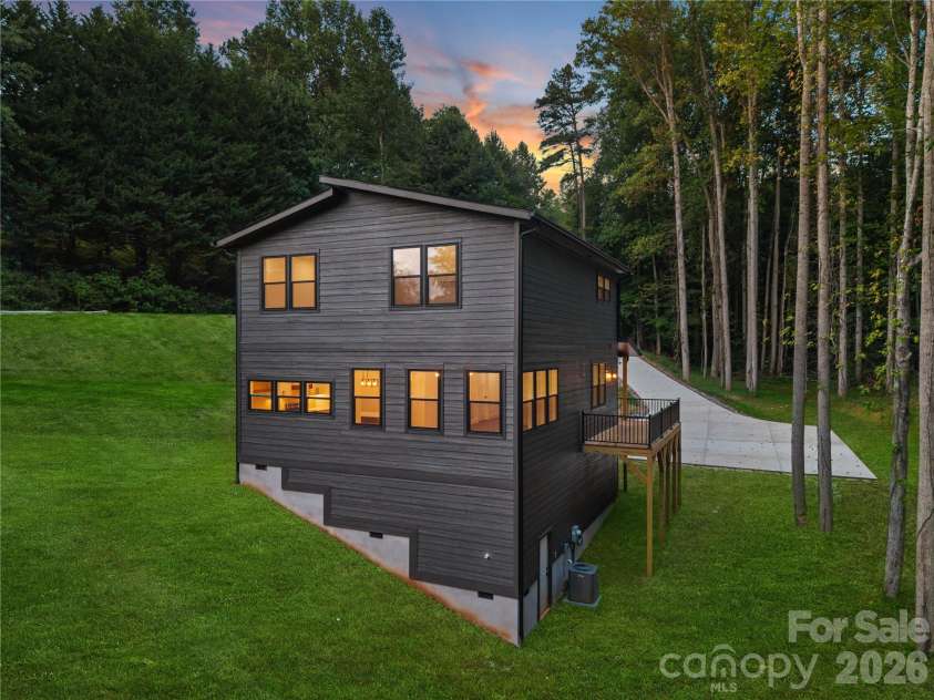 129 Quiet Woods Drive, Leicester, NC 28748.  MLS# CAR4417531, YatesRealty ID 47047. Virtually enhanced grass