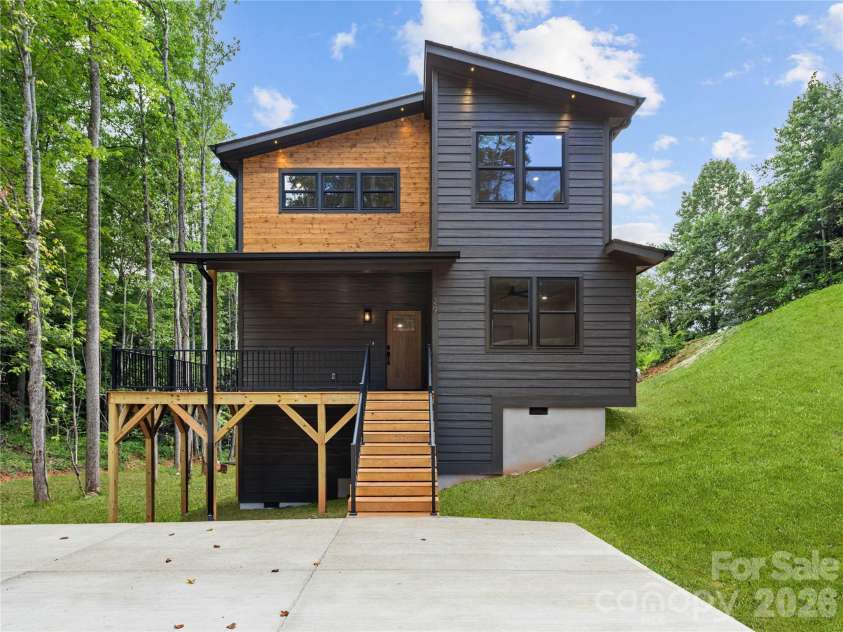 129 Quiet Woods Drive, Leicester, NC 28748.  MLS# CAR4417531, YatesRealty ID 47047. Virtually enhanced grass
