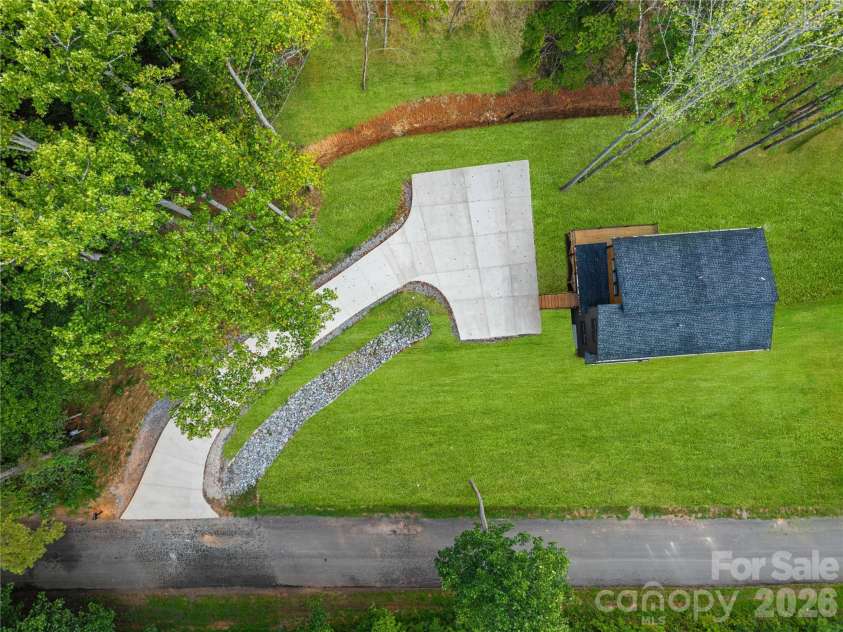 129 Quiet Woods Drive, Leicester, NC 28748.  MLS# CAR4417531, YatesRealty ID 47047. Virtually enhanced grass