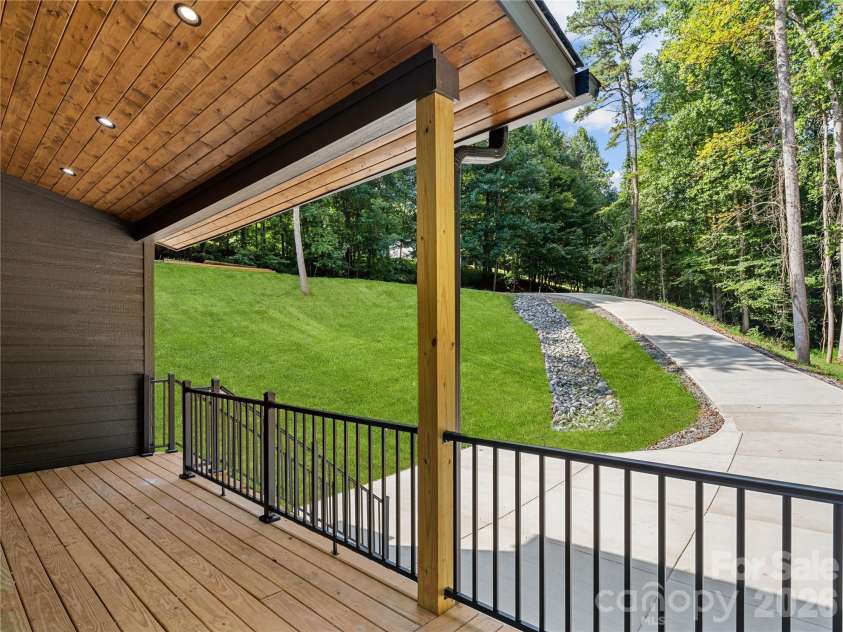 129 Quiet Woods Drive, Leicester, NC 28748.  MLS# CAR4417531, YatesRealty ID 47047. Virtually enhanced grass