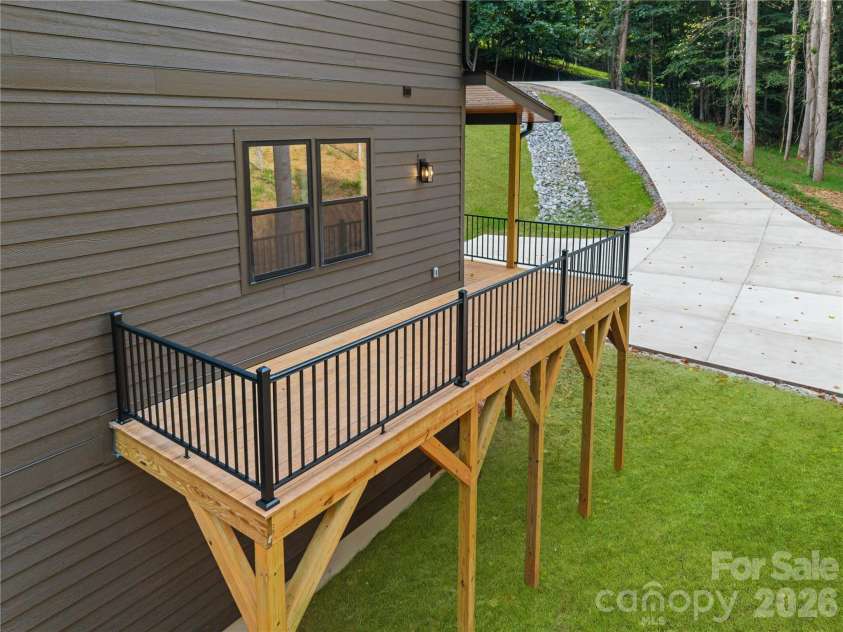 129 Quiet Woods Drive, Leicester, NC 28748.  MLS# CAR4417531, YatesRealty ID 47047. Virtually enhanced grass