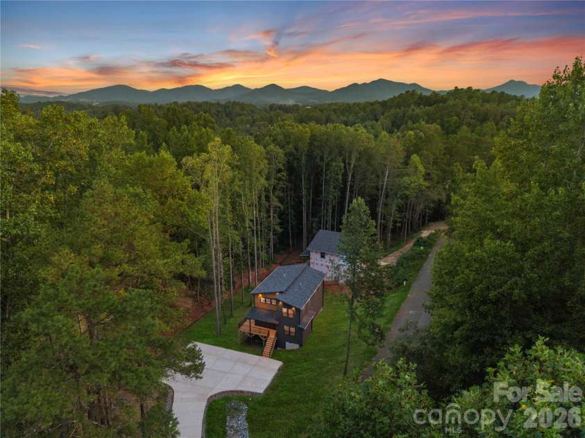 129 Quiet Woods Drive, Leicester, NC 28748.  MLS# CAR4417531, YatesRealty ID 47047. Virtually enhanced grass