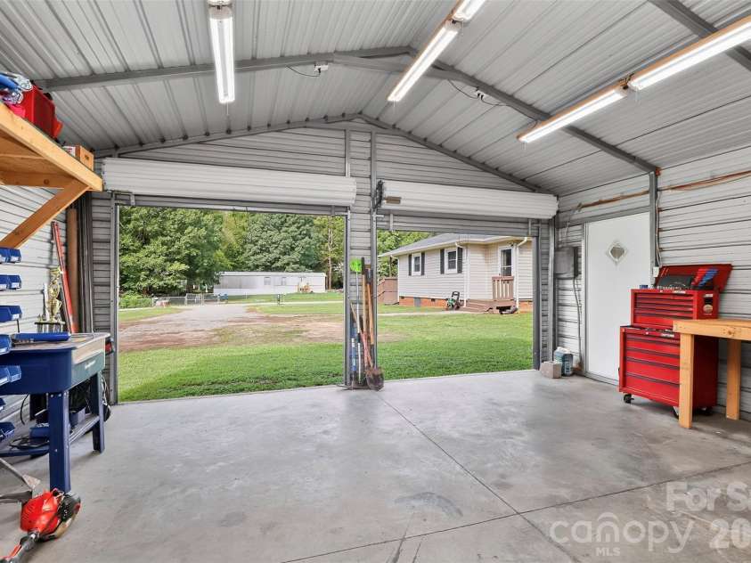 4320 Country Pride Lane, Rock Hill, SC 29730.  MLS# CAR4418161, YatesRealty ID 47050. Roll up doors and electric