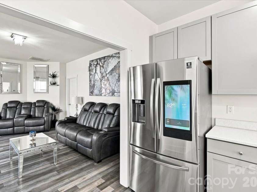 15 Hyde Park Place, Arden, NC 28704.  MLS# CAR4416533, YatesRealty ID 47055. High-end Samsung fridge with digital screen