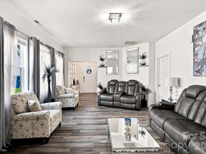 15 Hyde Park Place, Arden, NC 28704.  MLS# CAR4416533, YatesRealty ID 47055. Light filled living room