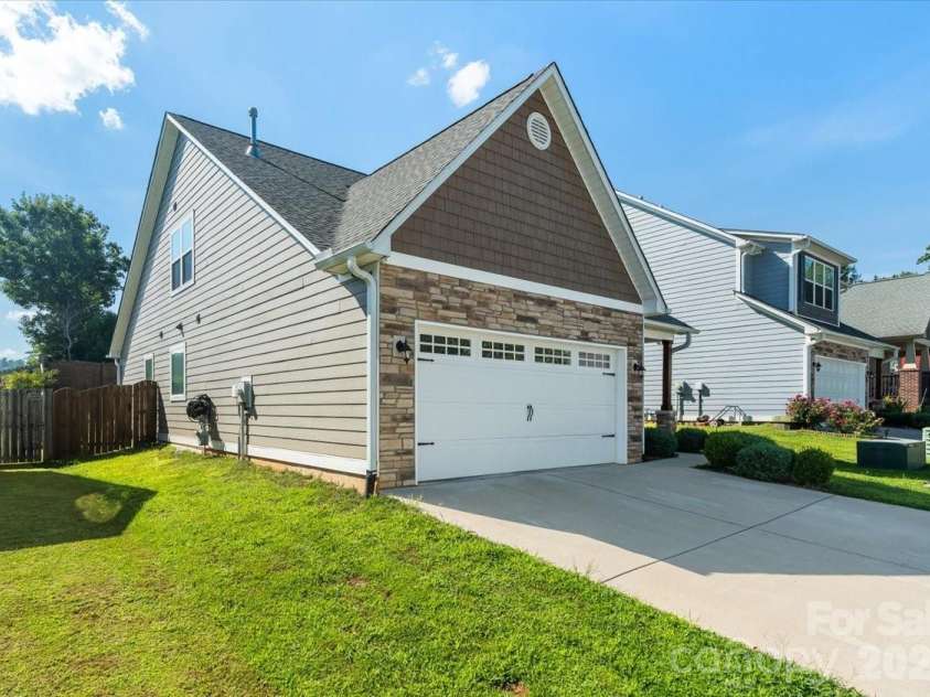 15 Hyde Park Place, Arden, NC 28704.  MLS# CAR4416533, YatesRealty ID 47055. Two Car garage with level driveway